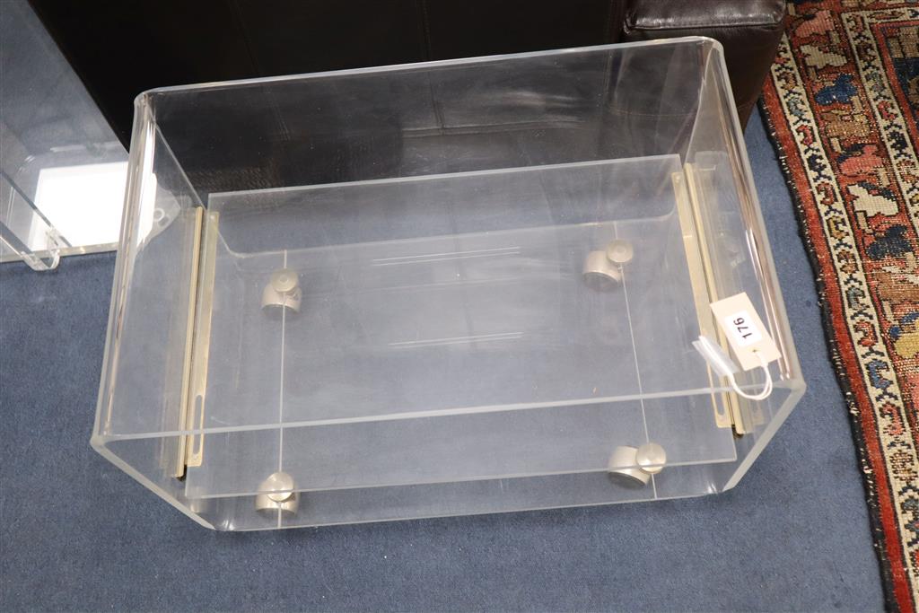 A 1970s lucite wheeled stand, width 65cm x depth 40cm, height 47cm